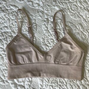 Blush colored Lululemon sports bra